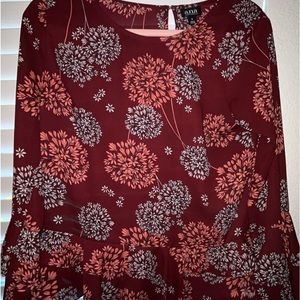 Flowy sheer dress top.